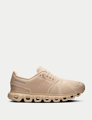 On cloud beige shoes￼