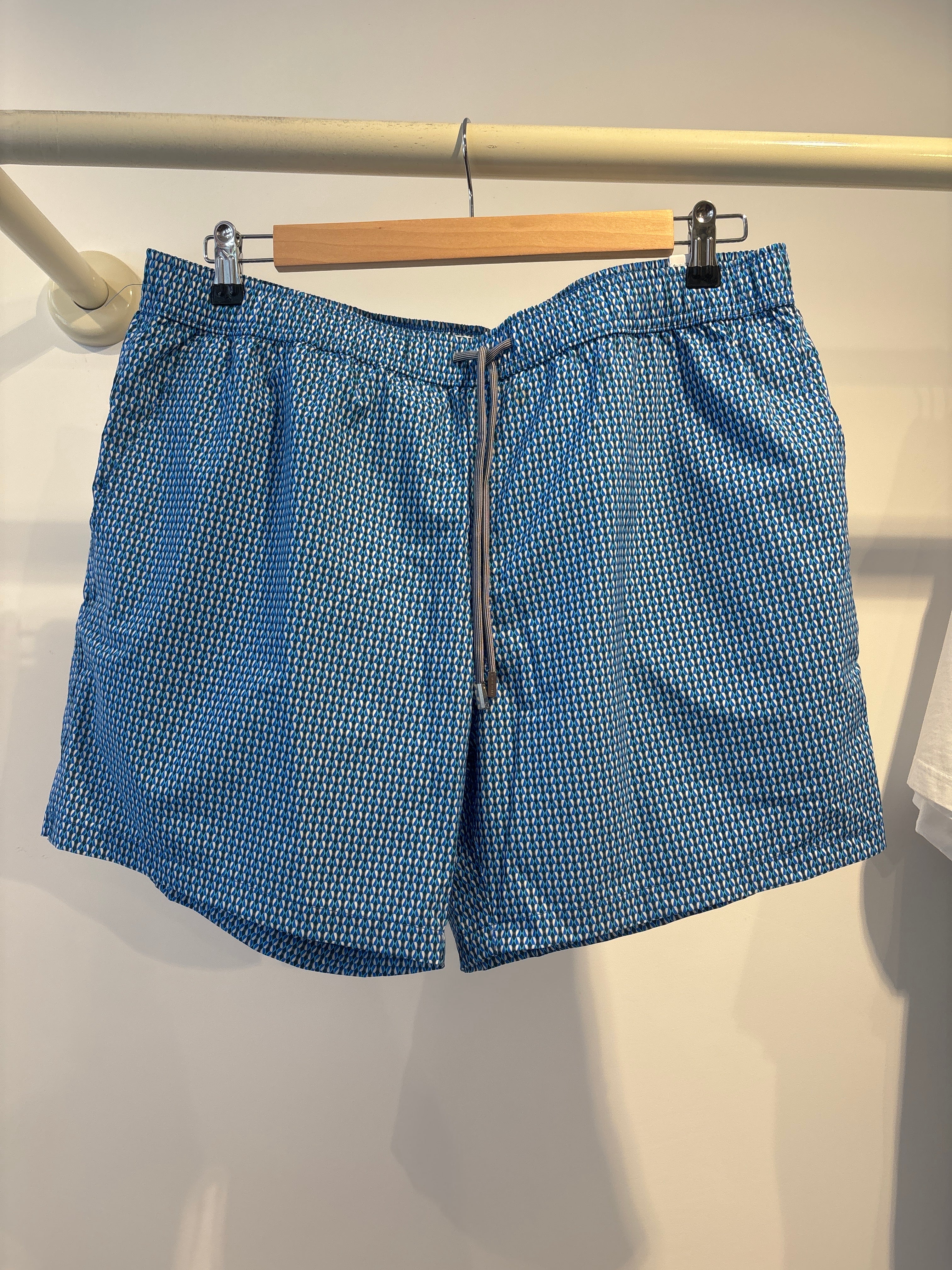 Public beach blue designed swimwear ￼￼