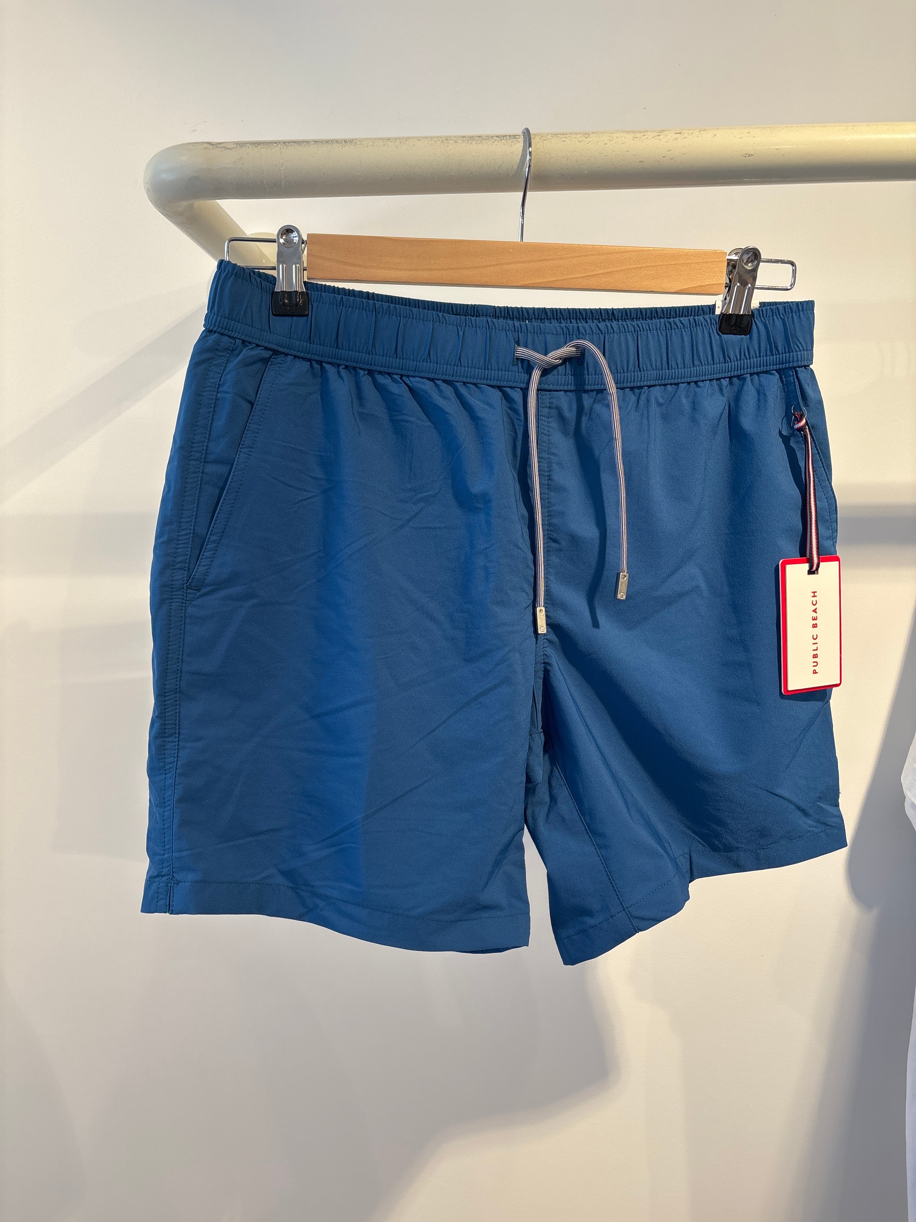 Public beach all blue swimwear ￼