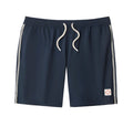 Public beach dark blue and white strip swimwear ￼￼￼