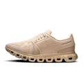 On cloud beige shoes￼
