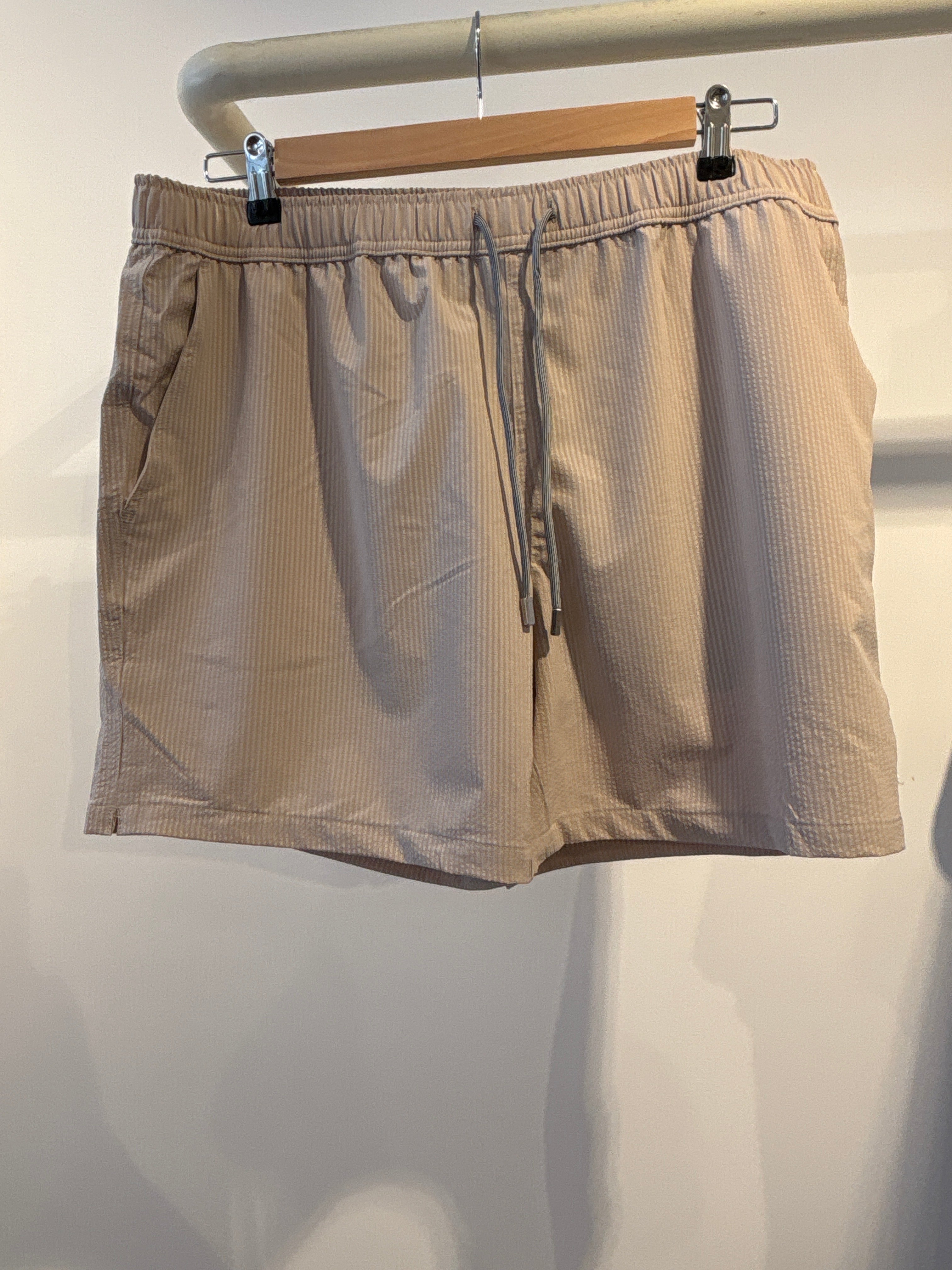 Public beach textured beige swimwear ￼