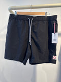Public beach black swimwear ￼