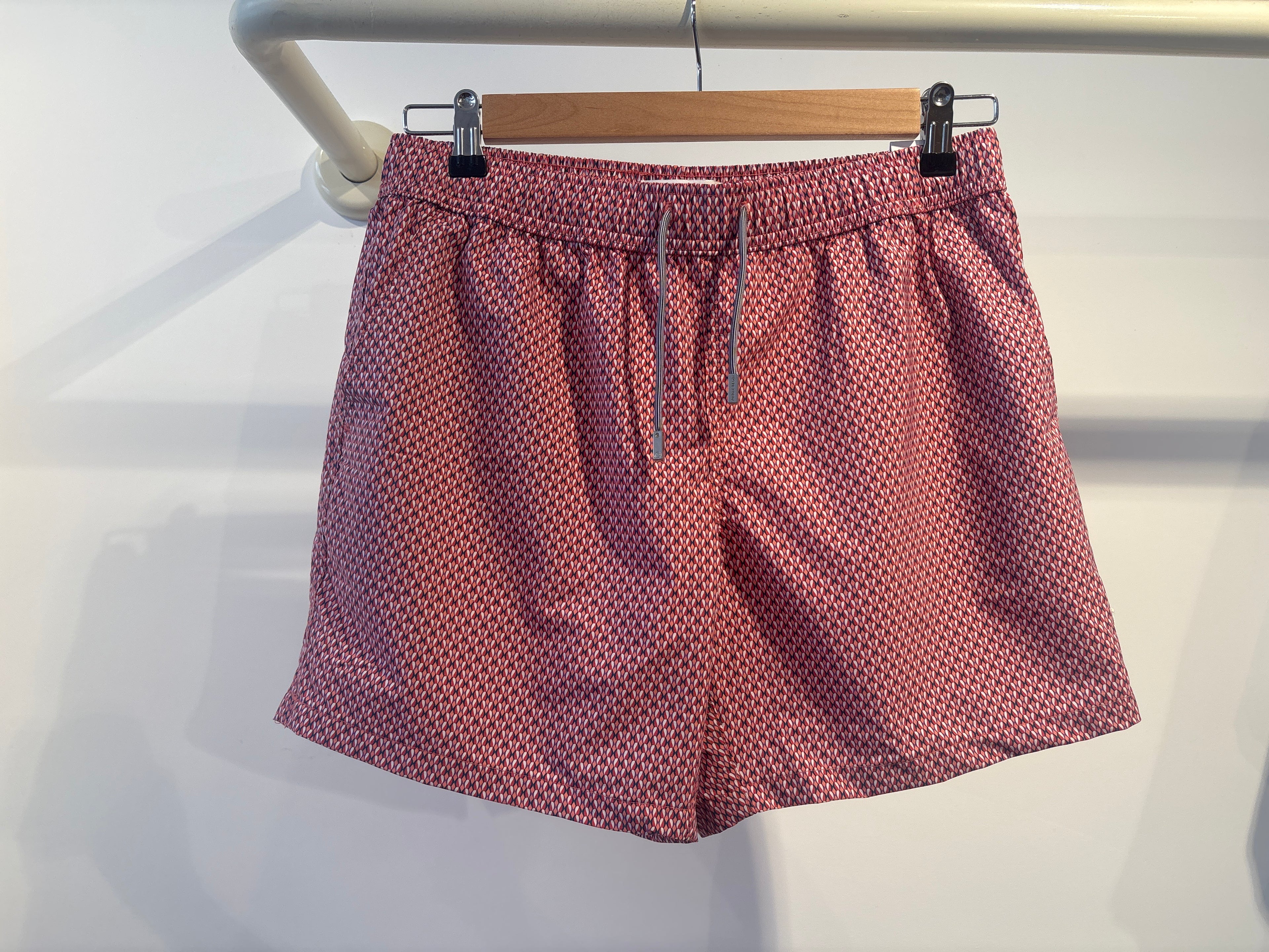 Public beach red designed swimwear￼￼