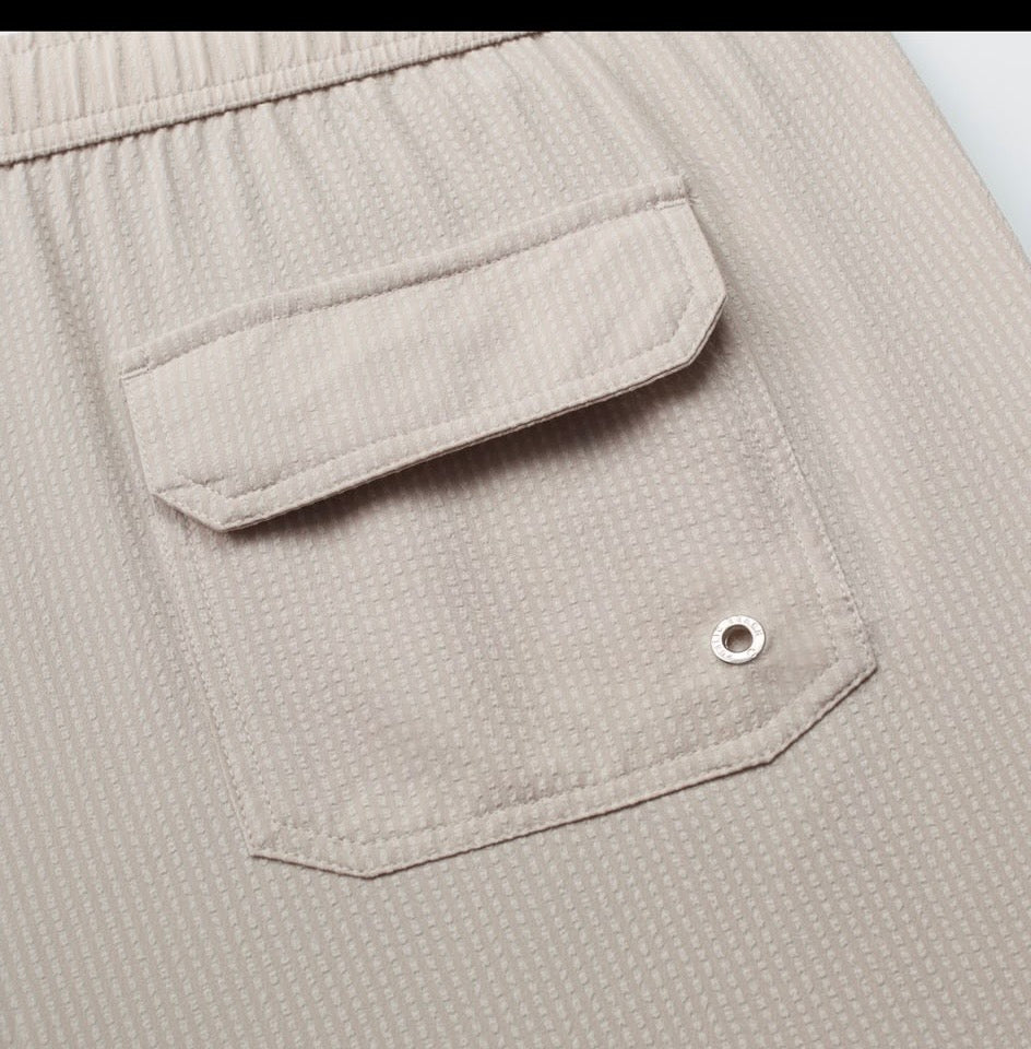 Public beach textured beige swimwear ￼